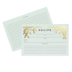 two recipe cards on top of each other with gold foil flowers and leaves in the middle