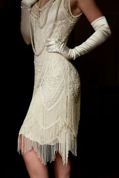 I was born in the wrong era! I Love This Charleston Cream Bone Dress! The Charleston dress delivers all the sass and flash of the Roaring 20's! Flapper Wedding Dresses, Flapper Wedding, 1920s Wedding Dress, Charleston Dress, Kristina Webb, Detail Couture, 1920s Flapper Dress