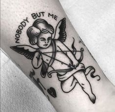 a tattoo with an angel holding a bow and arrow on it's arm that says nobody but me