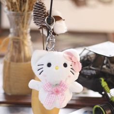 Looking for a cute and lovable accessory to add to your bag or keys? Look no further than our Sanrio keychain featuring four of the brand's beloved characters: Kuromi, My Melody, KT Cat, and PC Dog Hello Kitty! Each plush figure is 10cm in size and made with high-quality materials, ensuring that they are soft, durable, and perfect for cuddling. These anime-inspired toys are sure to delight fans of Sanrio and cute animals alike. Attach these adorable plush figures to your bag, keys, or anywhere e Dog Hello, Sanrio Keychain, Cartoon Bow, Kitty Plush, Cat Cute, Hello Kitty Plush, Kids Birthday Gifts, Anime Cartoon, Takara Tomy