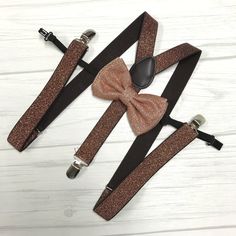 "Adults/Teens Elastic Suspender, Bow-tie All dimensions are approximate only Suspender Dimensions: Wide : 1\" (2.5cm) Adjustable from 25\" 63.5cm - 38\" (96.52cm) Bow Tie Dimensions: Length: 12cm (4.7 inches) Height (Widest Point): 6cm (2.36 inches) Height (Narrowest Point): 2.3cm (0.90 inches) Length of Bow Tie Strap at full length: 48cm (18.89 inches)" Suspenders For Kids, Tie Matching, Rose Gold Glitter, Wedding Photoshoot, Suspenders, Gold Glitter, Matching Sets, Bow Tie, Wedding Photos