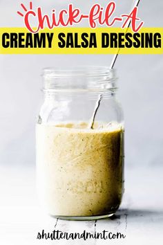 a jar filled with creamy salsa dressing and the words chick - fet creamy salsa dressing