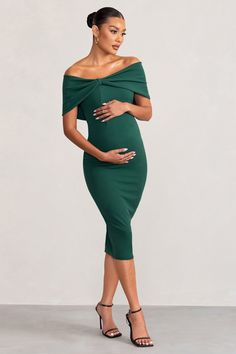 Alyssa | Bottle Green Bardot Bow Maternity Midi Dress with Ruching Maternity Formal Wear, Maternity Wardrobe Essentials, Green Maternity Dress, Green Maternity Dresses, Midi Bridesmaid Dress, Dress With Ruching, Baby Shower Dress, Green Jersey, Maternity Midi Dress