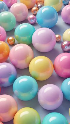 there are many different colored balls on the table together in this photo and it looks like they have been made out of candy