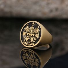 Handmade Family Symbol Ring, Personalized Engraved Family Ring, Customizable Name Coat of Arms Ring, Family Crest Ring, Family Name Ring Product Details: ✅Material: 925 Sterling Silver, Gold Coating,  Black Rhodium Coating ✅Ring Size: Available in various sizes (please refer to our sizing chart) ✅Dimensions: 22mm XLarge, 19mm Large, 17mm Medium, 16mm Small ✅ Weight: ±17gr XLarge, ±13gr Large, ±8 Medium, ±6gr Small 🛡️ Discover our custom coat of arms jewelry, a symbol of heritage made uniquely yours! 🌟💍 Choose your family crest and let us bring it to life with expert craftsmanship. 🖌️✨ Our artisans create stunning pieces in silver, gold coating, or rhodium coating, tailored to your preferences. 💫🔒 With attention to detail and a touch of elegance, our jewelry collection includes signet Luxury Ceremonial Hallmarked Signet Ring, Arms Jewelry, Luxury Heirloom Signet Ring With Coat Of Arms, Mens Family Crest Ring, Signet Ring Family Crest, Signet Ring Men Family Crest, Family Crest Symbols, Family Crest Ring, Family Symbol