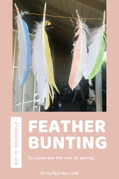 some feathers hanging from a line with the words feather bunting