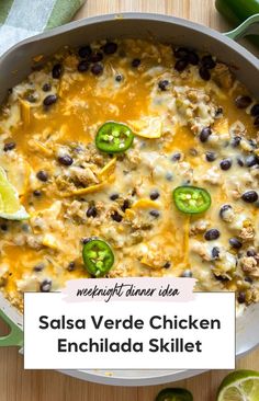 salsa verde chicken enchilada skillet with limes and jalapenos