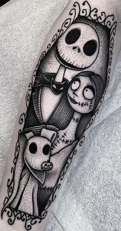 a black and white tattoo with the characters from the animated movie, jack and sally