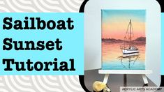 a sailboat sunset painting on an easel next to a seashell and sea shells