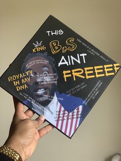 a person holding up a book that says, this is b s anti - free