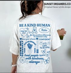 Spread positivity and good vibes with our "Be a Kind Human, Choose Happy" shirt, designed to radiate empathy and promote a message of kindness. Crafted with care and printed on high-quality fabric, this tee embodies the essence of good energy and encourages a mindset of positivity. Perfect for those who believe in spreading joy and embracing empathy, it's an ideal addition to any wardrobe. Elevate your style while making a statement with our best-selling t-shirt, guaranteed to inspire good vibes Relaxed Fit Smiley Face T-shirt, Groovy Relaxed Fit Graphic Print T-shirt, Good Vibes Shirt, Happy Shirt, Spread Kindness, Tank Top Hoodie, Choose Happy, Good Energy, Good Vibes Only