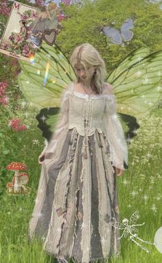 a fairy is standing in the grass