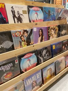 there are many cd's on display in the store