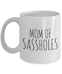 a white coffee mug with the words mom of sasahbles on it