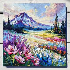 a painting of flowers in front of a mountain