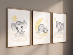 three baby elephant pictures hanging on the wall next to each other in a nursery room