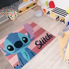 Kids and Parents will love the softness yet easy-care quality of this new collection of Licensed Rugs by Gertmenian. Who does not like this cute stranger from another planet? Any Stitch fan will love this soft and durable printed rug measuring 40"x54" Soft to the touch and easy to care, this rug is out of this world. Disney Stitch 3 X 5 (ft) Stitch Pink Indoor Spot Clean Only Area Rug | 19838 Lilo And Stitch Rug, Lilo And Stitch Room Decor, Stitch Room Ideas, Stitch Room Decor, Stitch Bedroom, Stitch Room, Stitch Things, Stitch Items, Lilo And Stitch Quotes