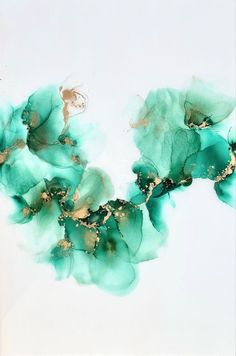 an abstract painting with green and gold leaves