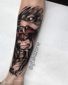 a man's leg with a tattoo on it