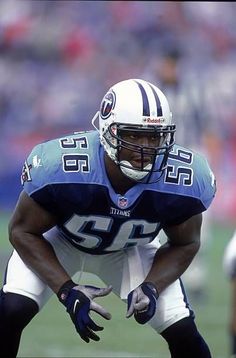 a close up of a football player on the field