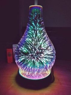 an image of a vase with lights on it and the caption below that reads, follow me