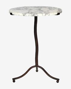 a marble top table with wheels on an iron base and wooden legs, against a white background