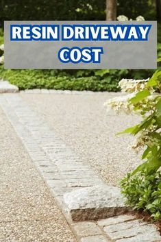 the words resinin driveway cost are in front of a garden with white flowers and green plants