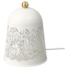 a white lamp with a gold ball on the top and an intricate design on the bottom