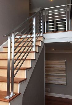 the stairs are made of wood and metal