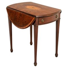 a small wooden table with a drawer on it's top and an open drawer at the bottom