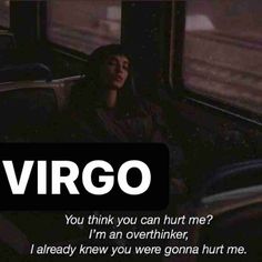 a woman sitting on a train with the words virgo in front of her face