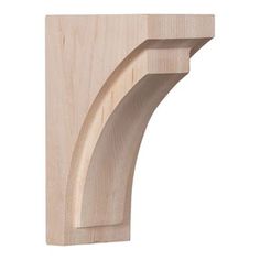 an unfinished wooden shelf bracket on a white background