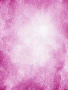 a pink and white background with clouds in the center that looks like something out of space