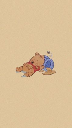 winnie the pooh is laying down on the ground with her head in her hands