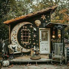 a small house decorated with stars and moon decorations