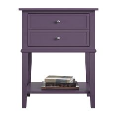 a night stand with two drawers and a book on it's bottom shelf, against a white background