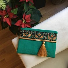 Green gold embroidered boho clutch | Etsy Pochette Diy, Bohemian Clutch, Boho Clutch, Diy Clutch, Embroidered Handbag, Jute Fabric, Floral Clutches, Embroidery Bags, Blue Handbags