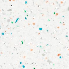 an abstract white background with multicolored confetti