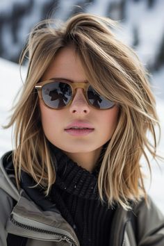 A layered lob is a hassle-free and fashionable hairstyle choice for the slopes. Its length is easy to manage while the layers add a modern touch, making it a great option for snowboarders who value style and convenience. Click to see more. Lob Outfits, Fine Hair Lob Shoulder Length, Blond Shag Hairstyles, Honey Blonde Long Bob, Trending Bobs 2024, Hair Styles With Glasses, Light Brown Lob, Modern Lob Haircut, Shaggy Lob For Fine Hair