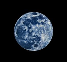 the full moon is seen in the dark sky