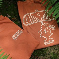 We’re extremely excited to announce that we are now officially partners in national park protection with the National Parks Conservation Association (NPCA). So excited in fact, that we just had to drop this fresh, outdoorsy, national-parks-inspired apparel. Shirt: Comfort Colors Adult Heavyweight Tee, "Yam". Shirts run slightly larger/roomier than your average T-Shirt. Pre-shrunk during the garment dye for no shrinkage at home. Design: T-Shirts skillfully hand-printed by Aardvark Screenprinting Outdoor Apparel Photography, Outdoor Tshirt Design, Granola Shirts, Camping T Shirts Ideas, Outdoorsy Branding, National Park Tshirt, Camp T Shirt, Church Merch, Tshirt Style Outfit