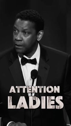 a man in a tuxedo speaking into a microphone with the words attention ladies on it