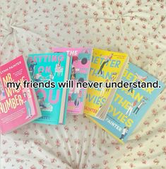 four books laying on top of a bed with the words my friends will never understand