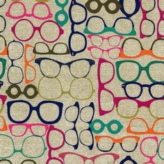 the glasses are all different colors and shapes on this wallpapered surface, which has been made to look like an abstract pattern