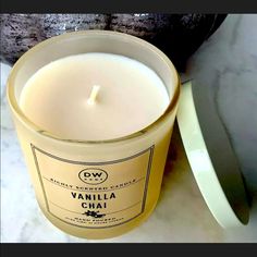 vanilla chai candle sitting on a marble counter