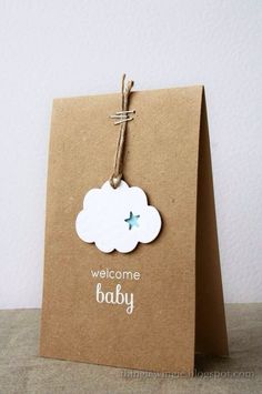 a welcome baby card with a cloud on it