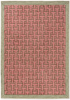 a pink and green rug with an intricate design on the bottom, along with a white border