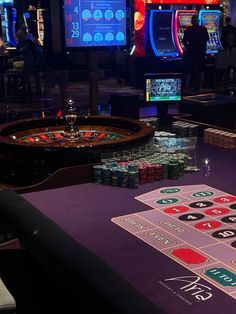 a casino table with chips and cards on it