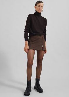 Color: Brown Lightweight woven fabric Regular fit Mini length Front zip detailing Slip-on style Unlined 80% Polyester 20% Elastane Dry Clean By The Frankie Shop. Imported Suede Skirt Combat Boots, Brown Suede Mini Skirt Outfit, Brown Mini Skirt Outfit, Suede Skirts, Brown Tights, Shop Your Closet, Brown Mini Skirt, Mini Skirt Outfit, Brown Knee High Boots