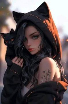 a woman in a hoodie holding a black cat